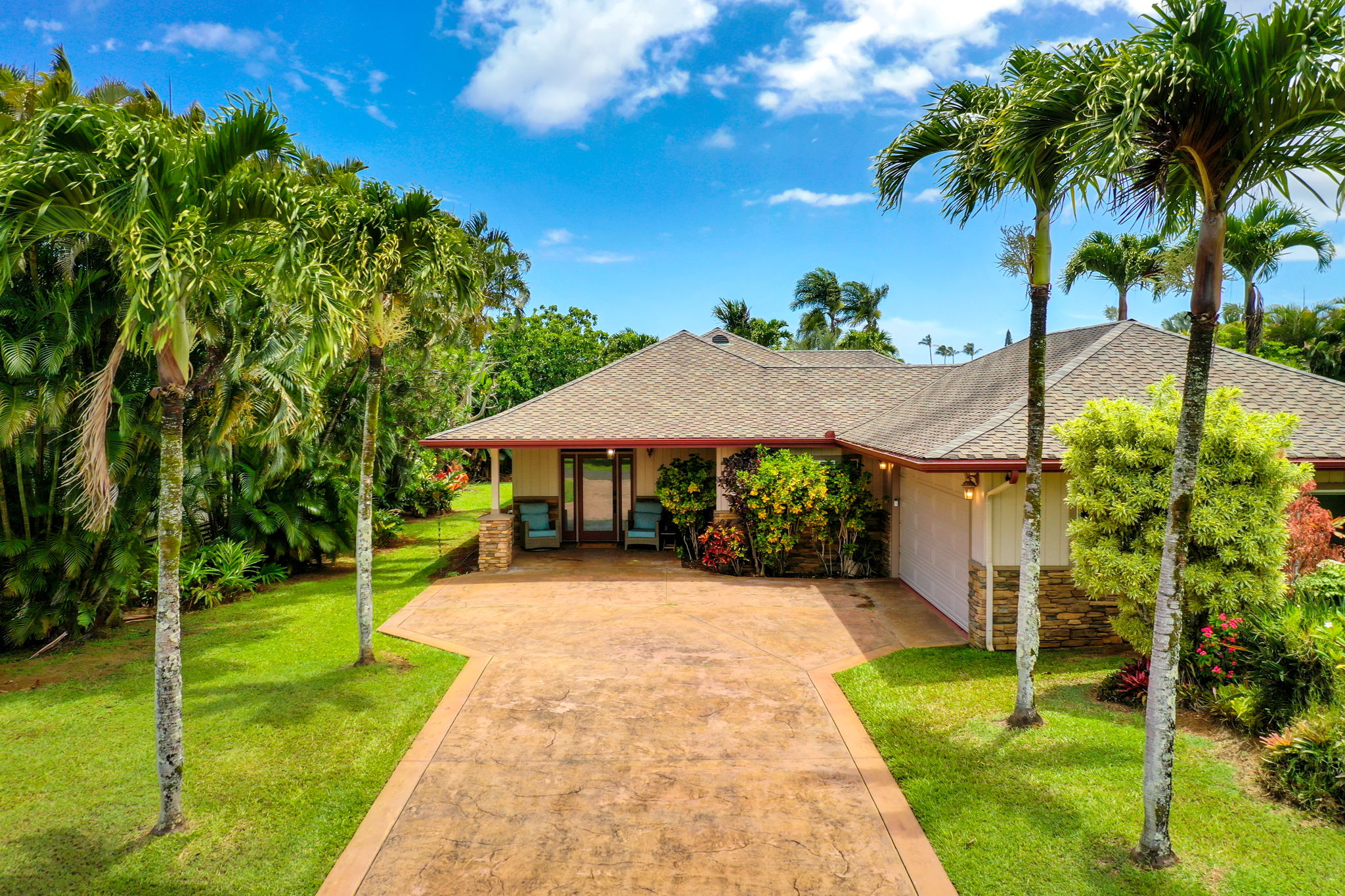 Emmalani Hale luxury Kauai hotel alternative in Princeville near Hanalei Bay with tropical landscaping